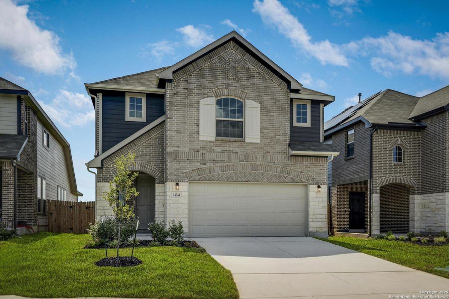 Front exterior of a new home in Morgan Meadows, San Antonio, TX, highlighting curb appeal (Image 19). Front exterior of a new home in Morgan Meadows, San Antonio, TX, highlighting curb appeal (Image 19).