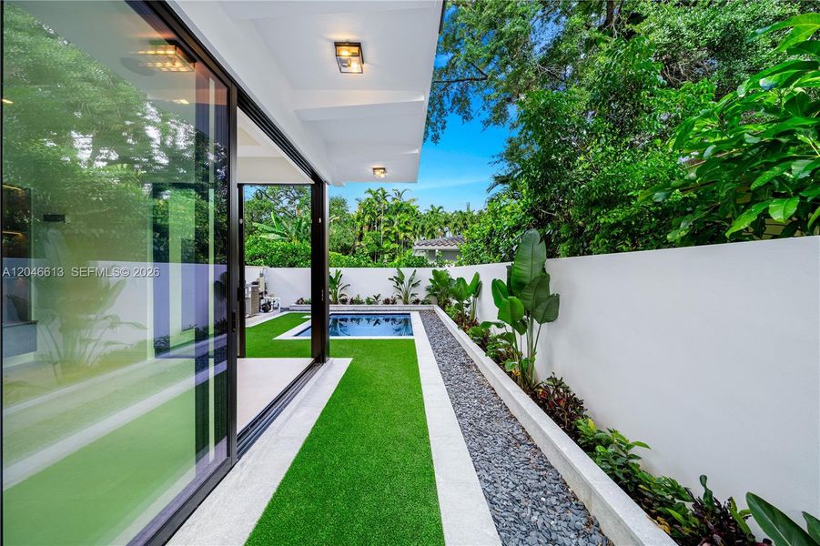 Exterior details and patio area of a home in , Coral Gables (Image 19). Exterior details and patio area of a home in , Coral Gables (Image 19).