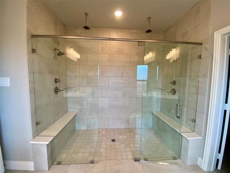 ENORMOUS master walk-in shower with 4 shower heads & 2 bench seats! ENORMOUS master walk-in shower with 4 shower heads & 2 bench seats!