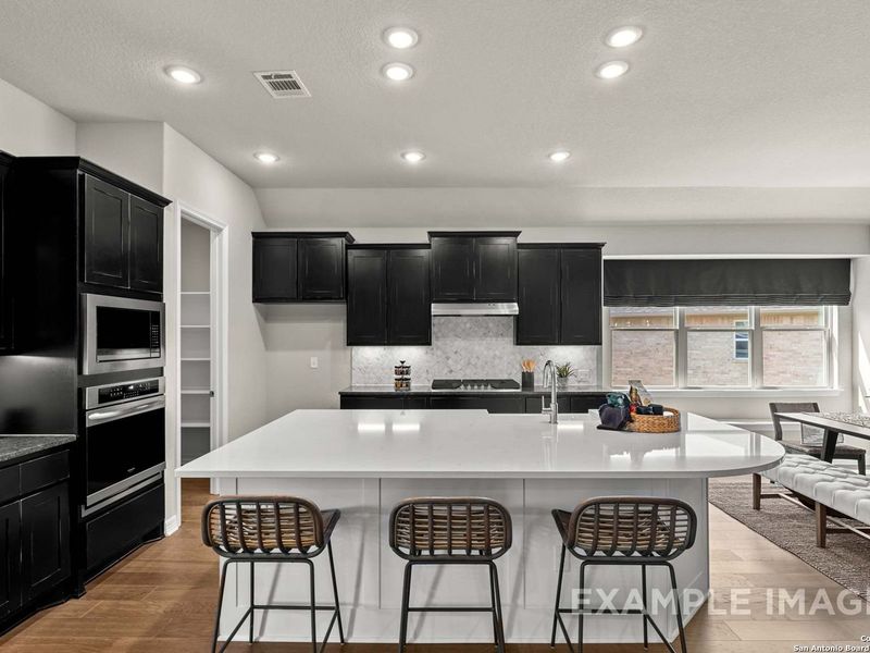 Furnished interior view inside a new home in Potranco Oaks, Castroville (Image 25).