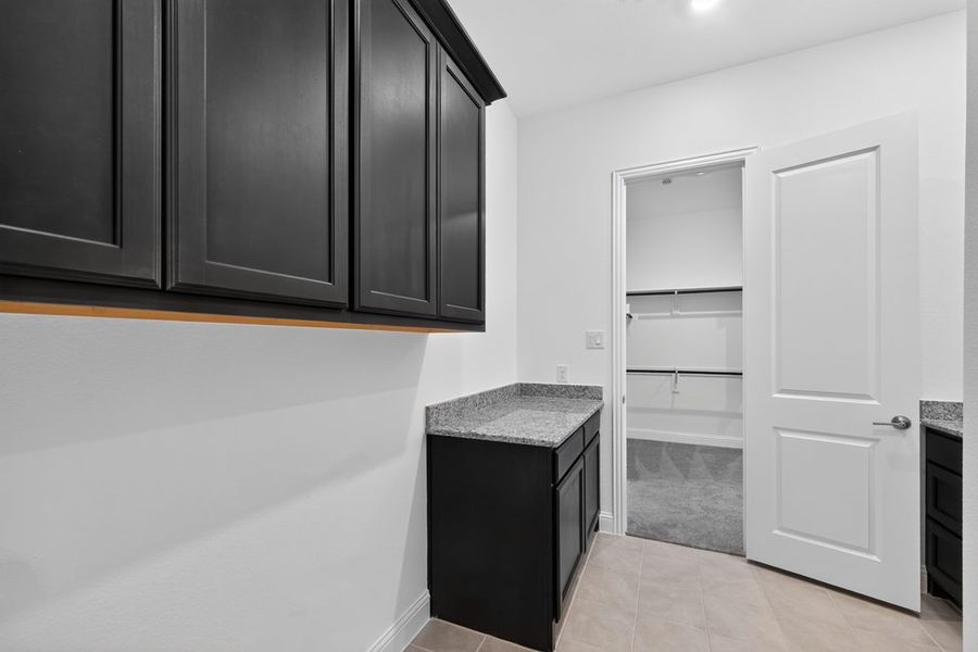 Furnished interior view inside a new home in The Ranch at Uptown Celina, Celina (Image 13).