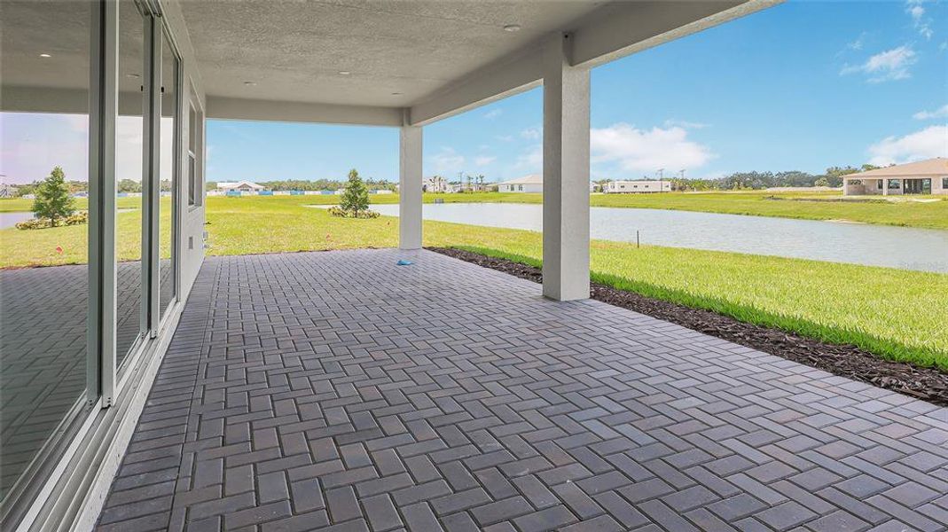 Exterior details and patio area of a home in Woodland Preserve, Parrish (Image 4).