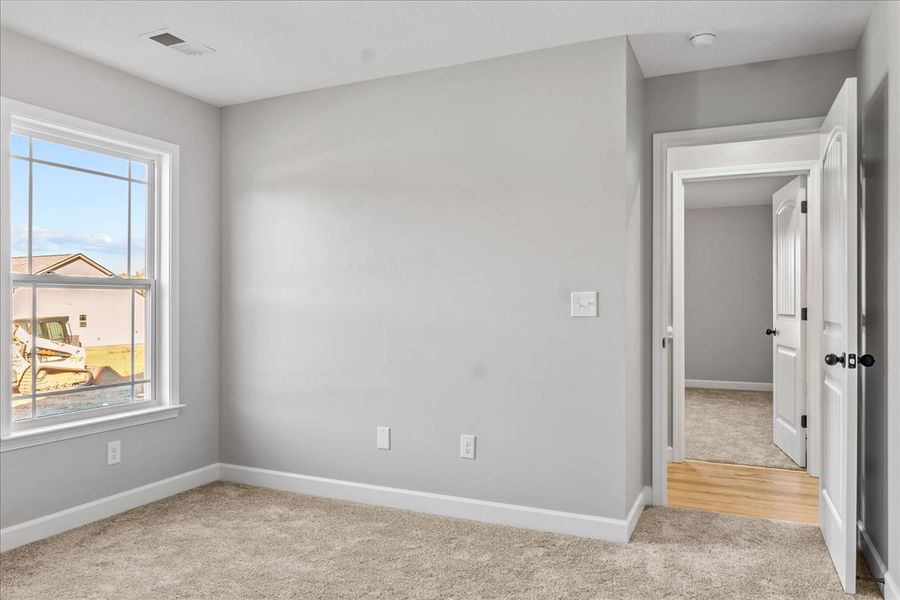 Representative unfurnished interior of a home built from the Whitney by Enchanted Homes in Lonesome Dove, San Antonio (Image 20).