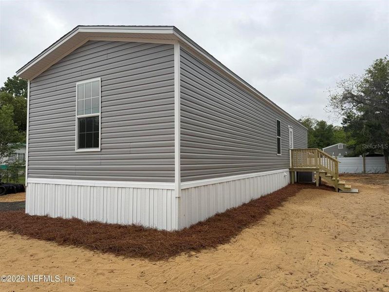 Exterior details and patio area of a home in , Interlachen (Image 16).