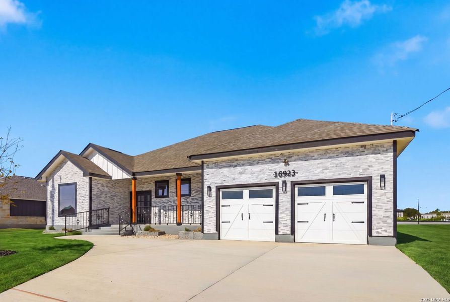 Front exterior of a new home in , Atascosa, TX, highlighting curb appeal (Image 29).