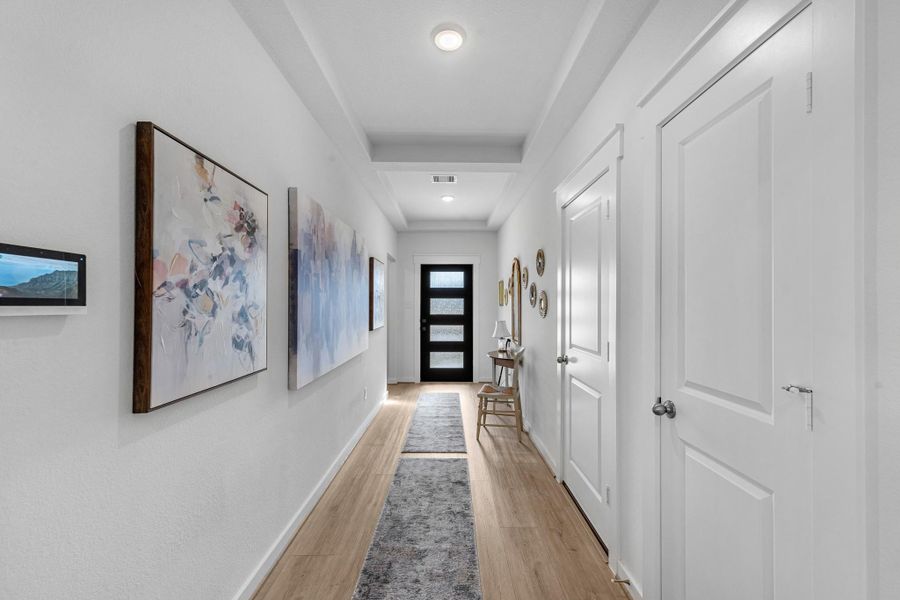 Inviting foyer that sets the tone for the home with an open and airy feel.