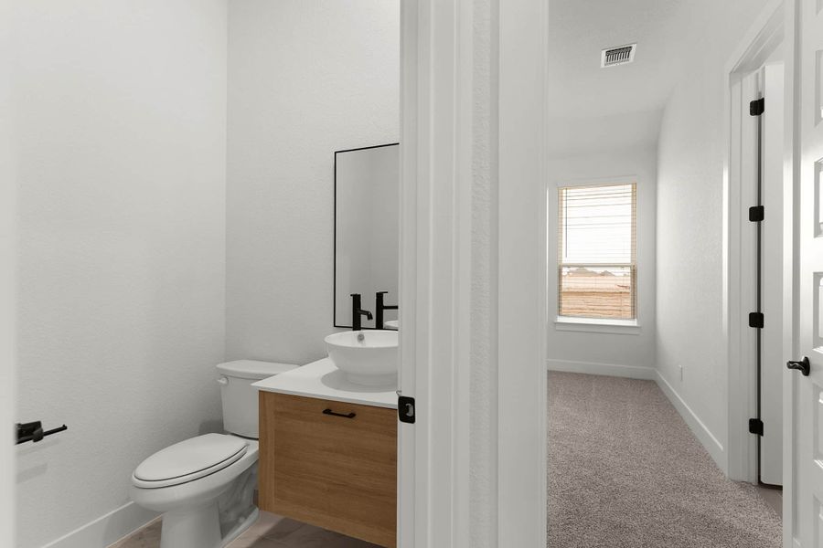 Furnished interior view inside a new home in The Grove at Blackhawk, Pflugerville (Image 8).