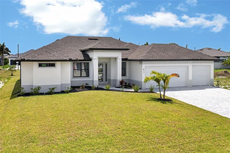 Front exterior of a new home in , Cape Coral, FL, highlighting curb appeal (Image 24).