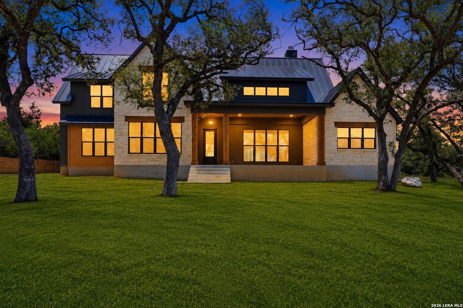 Exterior details and patio area of a home in , Spring Branch (Image 35).