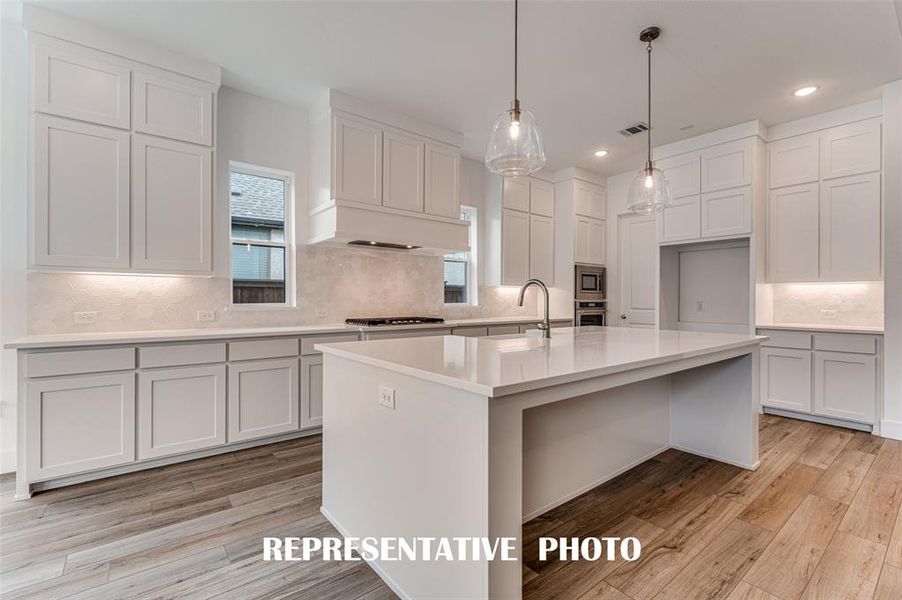 Style and sophistication abound in this dream kitchen!  REPRESENTATIVE PHOTO.