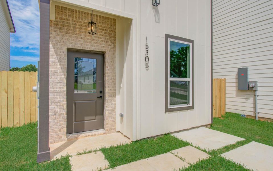 Exterior details and patio area of a home in , Willis (Image 4). Exterior details and patio area of a home in , Willis (Image 4).