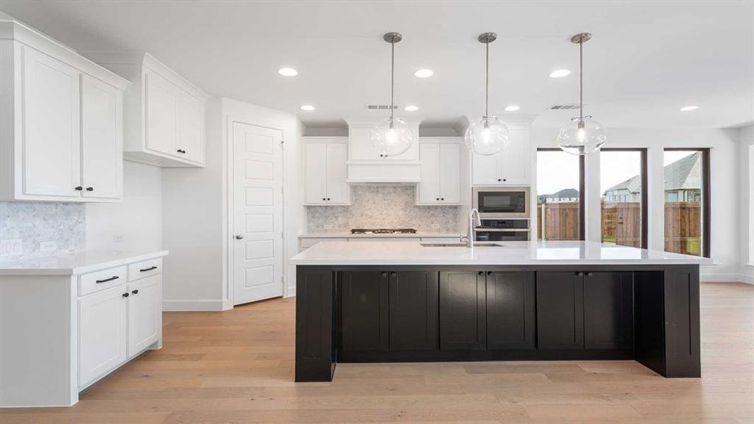 Furnished interior view inside a new home in Mosaic 50', Celina (Image 14). Furnished interior view inside a new home in Mosaic 50', Celina (Image 14).