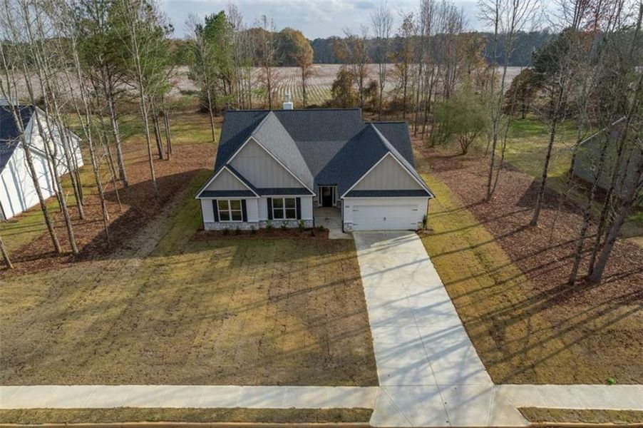 Front exterior of a new home in , Good Hope, GA, highlighting curb appeal (Image 19).