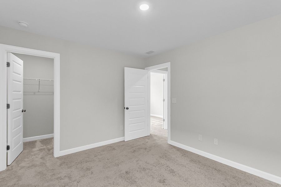 Spacious, unfurnished interior of a new home in Pineland Preserve, Summerville (Image 40).
