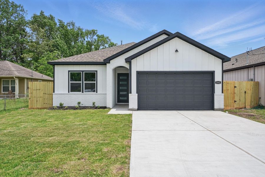 Front exterior of a new home in , Dayton, TX, highlighting curb appeal (Image 1).