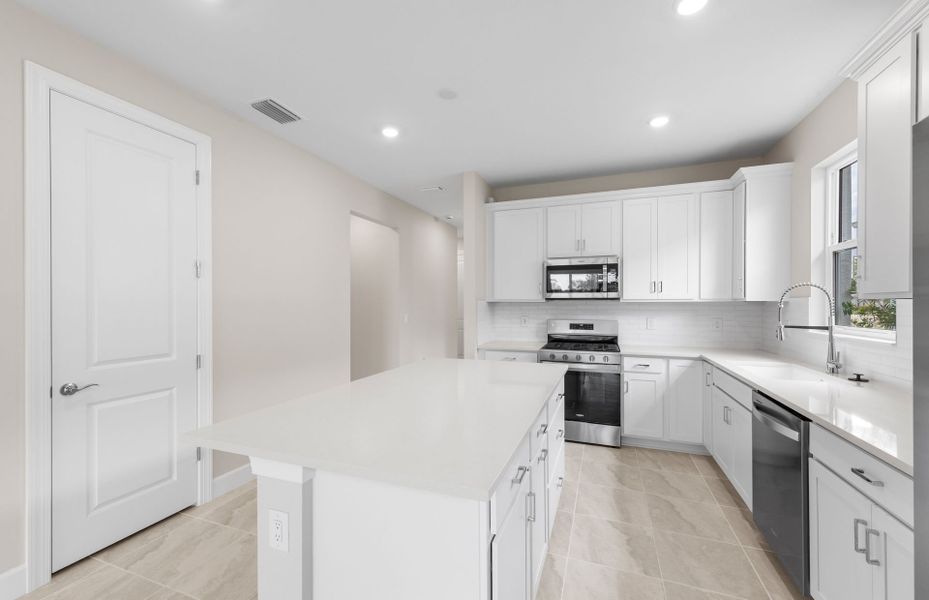 Furnished interior view inside a new home in Del Webb Oak Creek, North Fort Myers (Image 11).