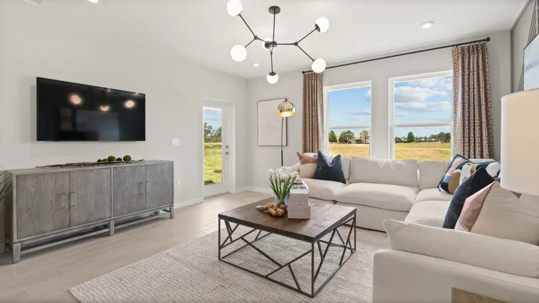 Modern Decorated Living Area with in this New Construction Home in Winter Haven Florida by DRB Homes in Willowbrook North Modern Decorated Living Area with in this New Construction Home in Winter Haven Florida by DRB Homes in Willowbrook North