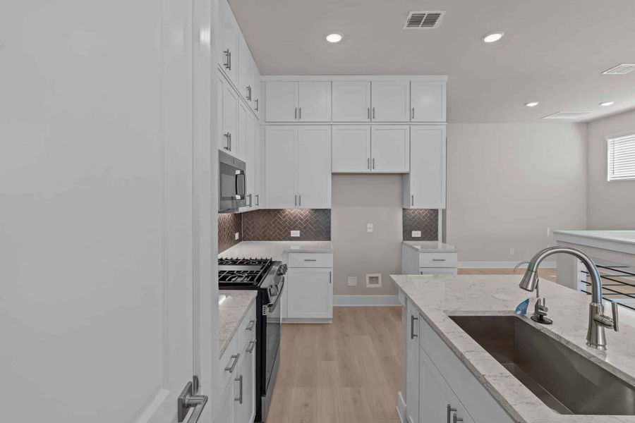 Furnished interior view inside a new home in Rose Hill, San Antonio (Image 7). Furnished interior view inside a new home in Rose Hill, San Antonio (Image 7).