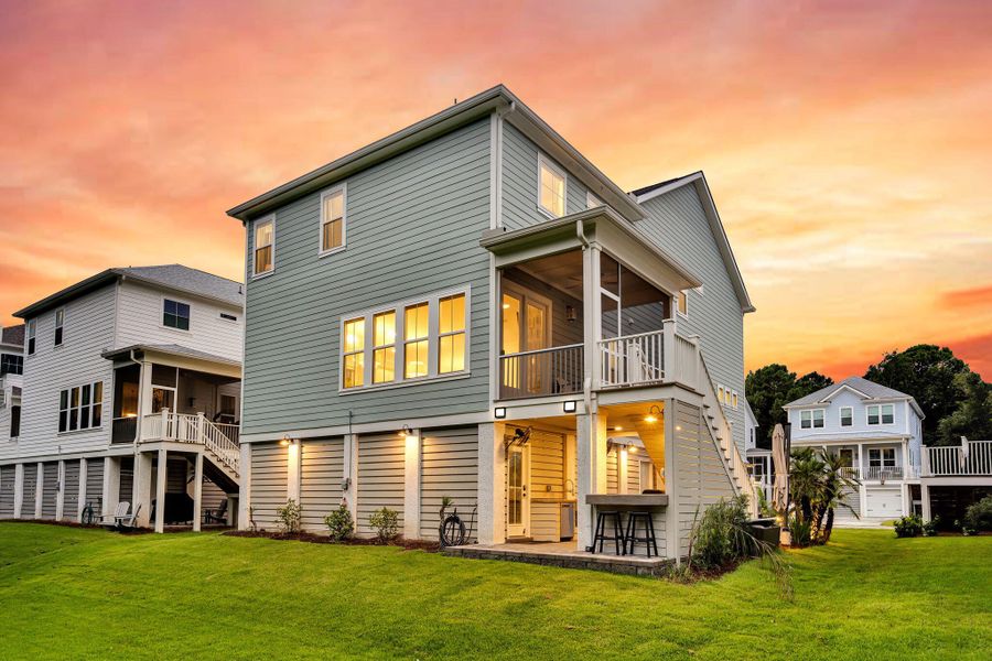 Exterior details and patio area of a home in Overlook at Copahee Sound, Awendaw (Image 3).