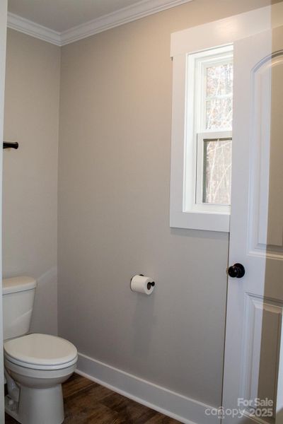 primary bathroom toilet and linen closet