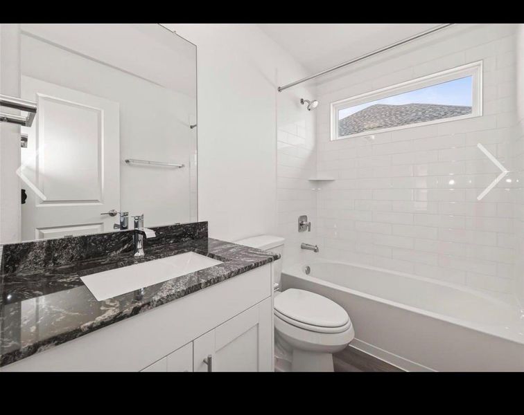Furnished interior view inside a new home in Harvest Green, Richmond (Image 15).