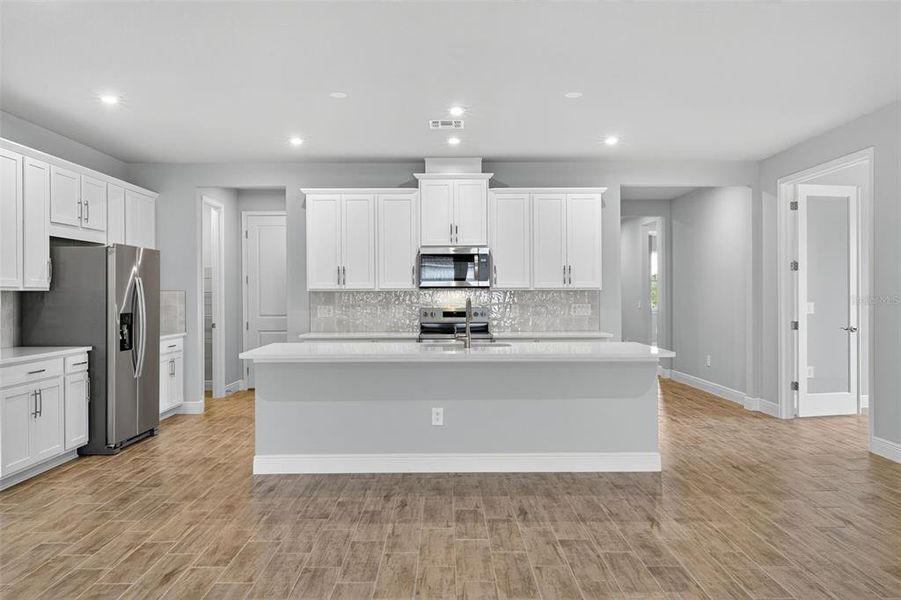 Furnished interior view inside a new home in Windwater, Parrish (Image 8).