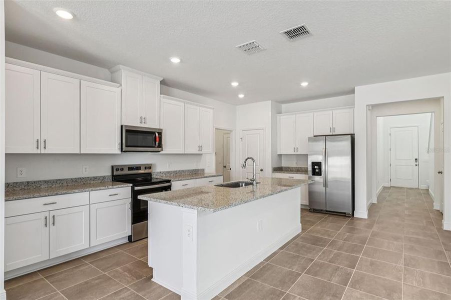 Furnished interior view inside a new home in , Clermont (Image 5). Furnished interior view inside a new home in , Clermont (Image 5).