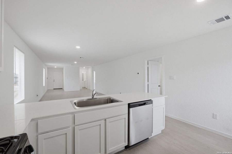 Furnished interior view inside a new home in Rose Valley, Converse (Image 7).