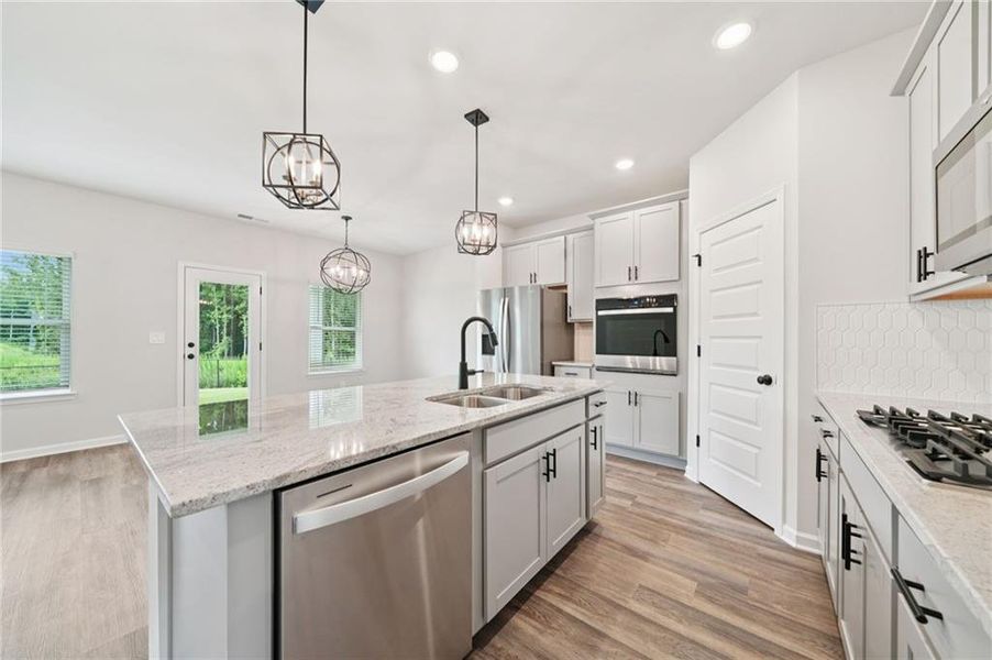 Furnished interior view inside a new home in Vines at Mill Creek - Estate Series, Braselton (Image 12).