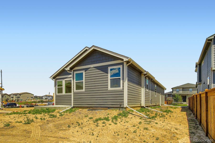 Front exterior of a new home in Buffalo Highlands – Commerce City, Commerce City, CO, highlighting curb appeal (Image 21).