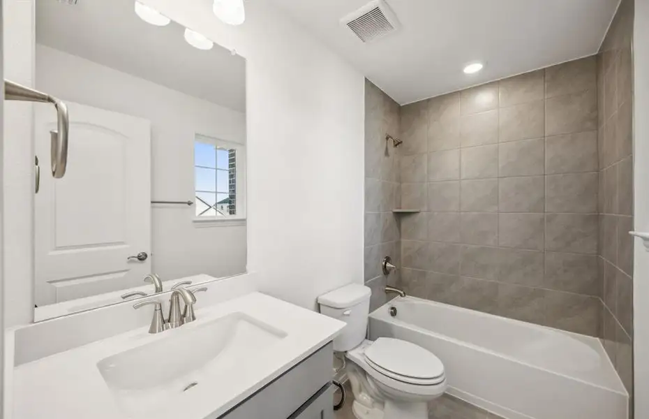 Spacious secondary bathroom *real home pictured