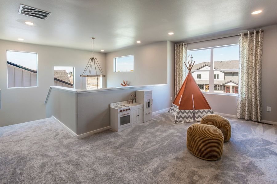Representative furnished interior of a home built from the Rowling by Hartford Homes in Trailside, Timnath (Image 55).