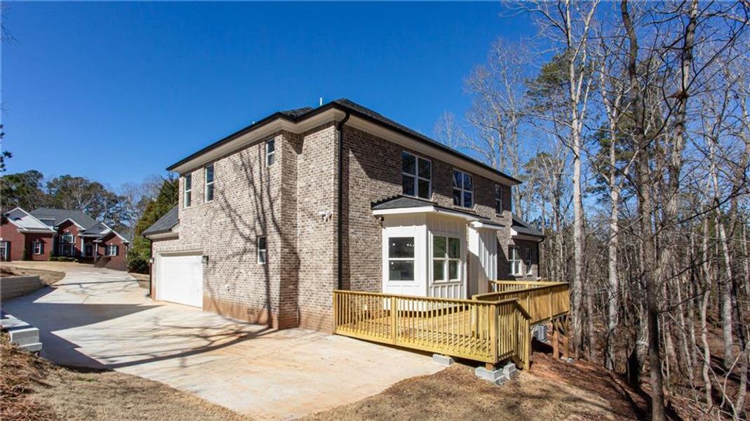 Exterior details and patio area of a home in , McDonough (Image 27).