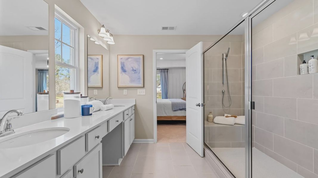 Representative furnished interior of a home built from the Wynwood by DRB Homes in Cottages of Bearwood, Mount Pleasant (Image 48).