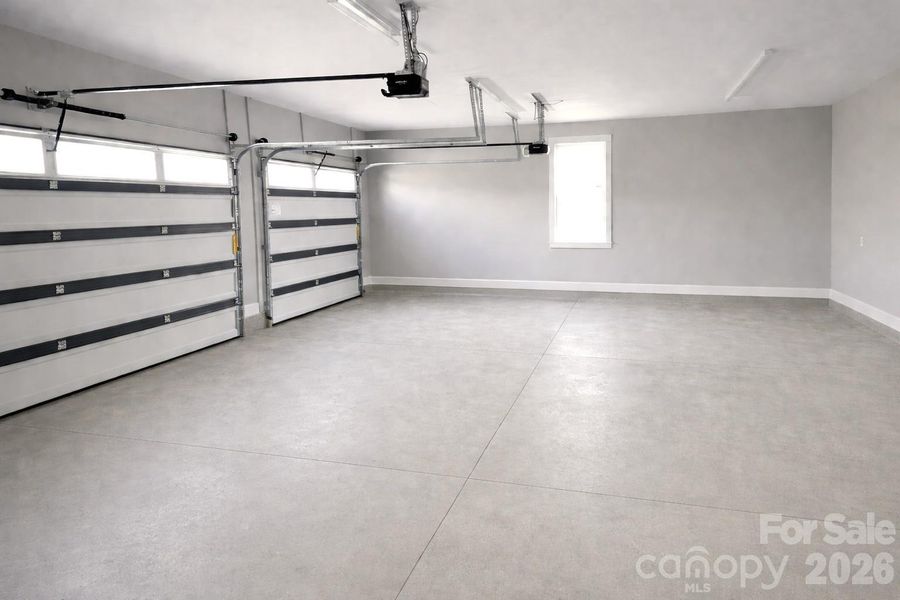 Wow! 3 Car Garage is a bonus. A double door & a single door.