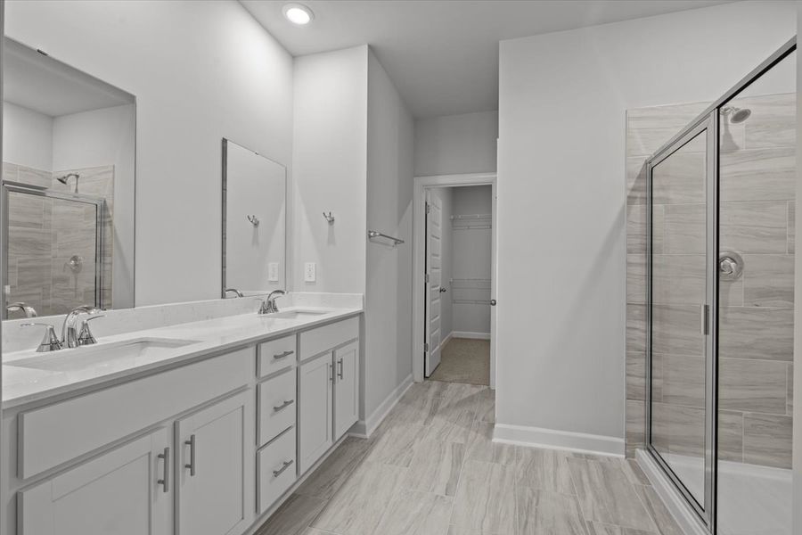 Furnished interior view inside a new home in The Farm at Wells Creek - Signature Collection, Gray Court (Image 8).