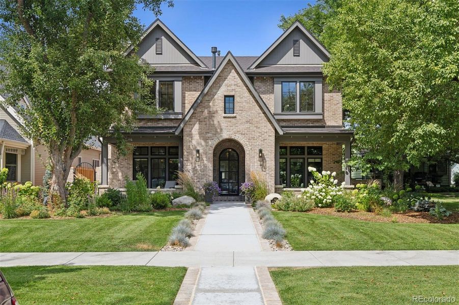 Front exterior of a new home in , Denver, CO, highlighting curb appeal (Image 18).
