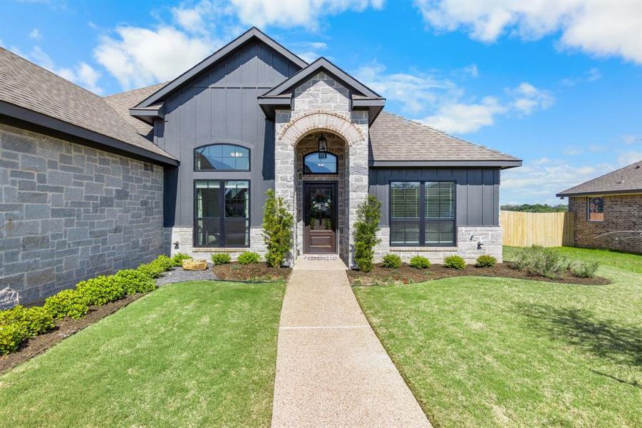 Front exterior of a new home in , Robinson, TX, highlighting curb appeal (Image 21). Front exterior of a new home in , Robinson, TX, highlighting curb appeal (Image 21).