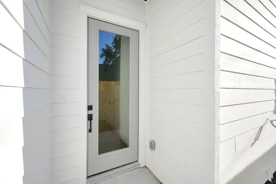 Exterior details and patio area of a home in , Houston (Image 2). Exterior details and patio area of a home in , Houston (Image 2).