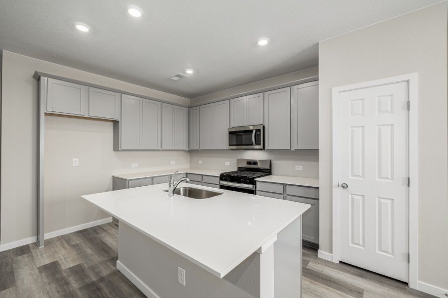 Furnished interior view inside a new home in Painted Prairie, Aurora (Image 8).