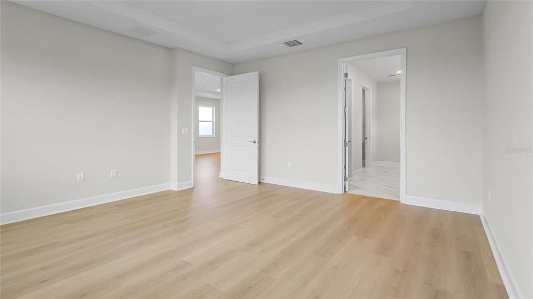 Spacious, unfurnished interior of a new home in Cresswind at Hammock Oaks, Lady Lake (Image 45).