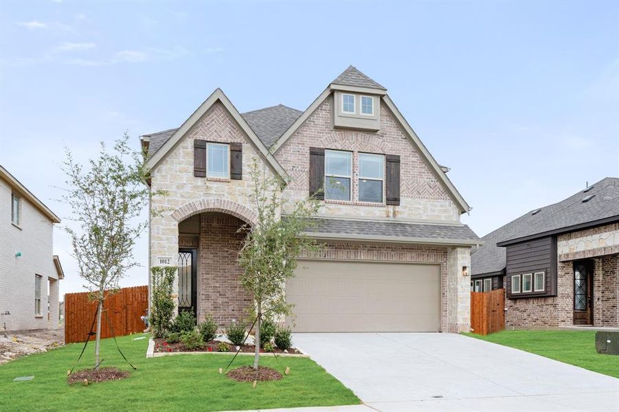 Front exterior of a new home in Star Ranch, Godley, TX, highlighting curb appeal (Image 19).