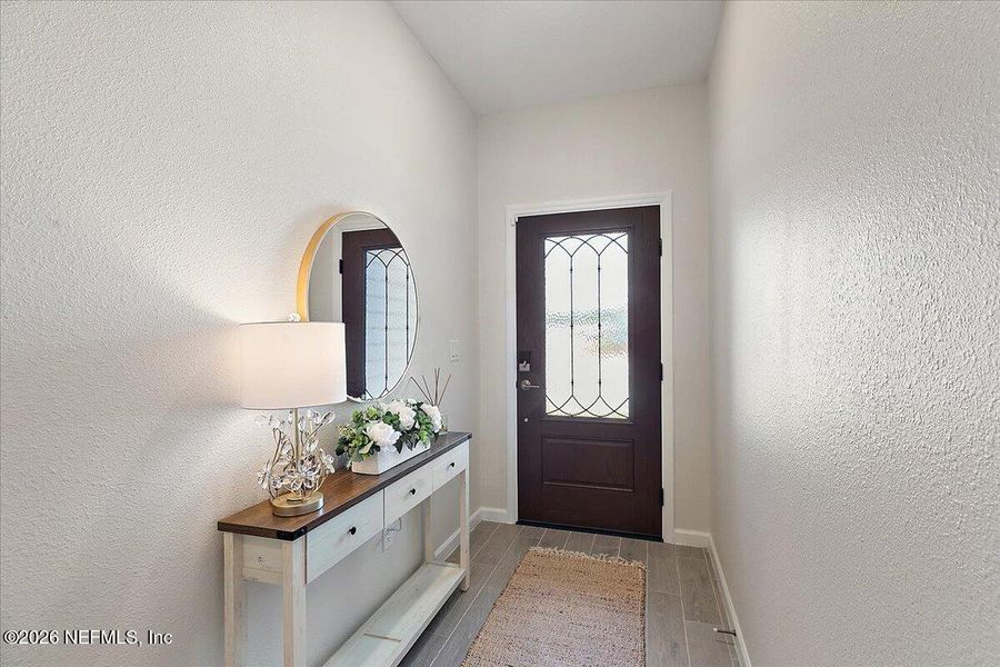 Furnished interior view inside a new home in Edenbrooke at Hyland Trail | 55+, Green Cove Springs (Image 9).