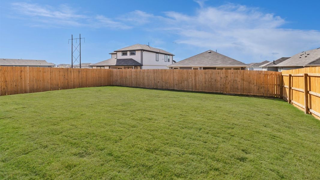 Exterior details and patio area of a home in Talavera, Kyle (Image 3).