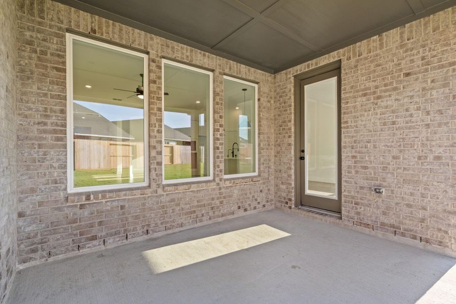 Exterior details and patio area of a home in Cross Creek West 50', Fulshear (Image 1). Exterior details and patio area of a home in Cross Creek West 50', Fulshear (Image 1).