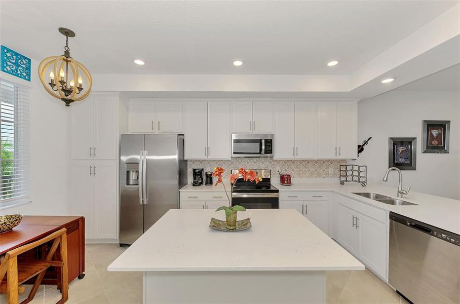 Furnished interior view inside a new home in Wellen Park Golf & Country Club, Venice (Image 9).