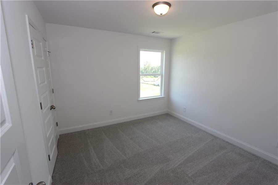Spacious, unfurnished interior of a new home in Clark Farms, Flowery Branch (Image 18).