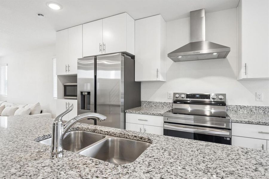 Furnished interior view inside a new home in Reunion, Commerce City (Image 9).