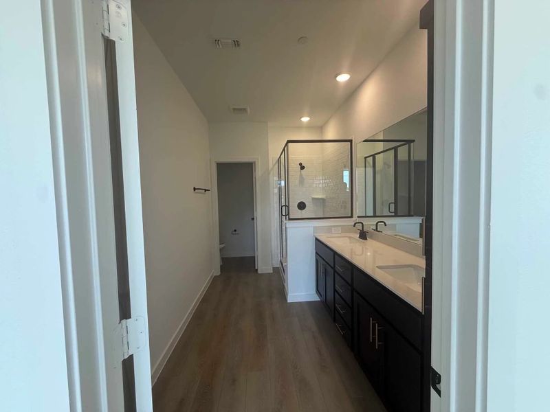 Primary Bathroom Construction Progress featuring the Noir Collection