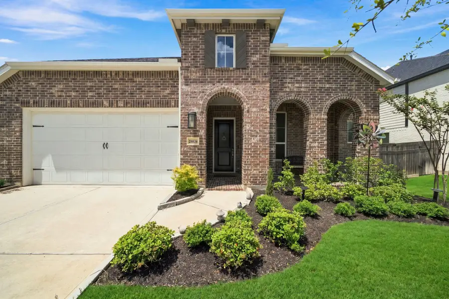 Front exterior of a new home in , Fulshear, TX, highlighting curb appeal (Image 1). Front exterior of a new home in , Fulshear, TX, highlighting curb appeal (Image 1).